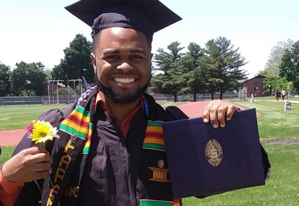 Domanique at his graduation from Knox College