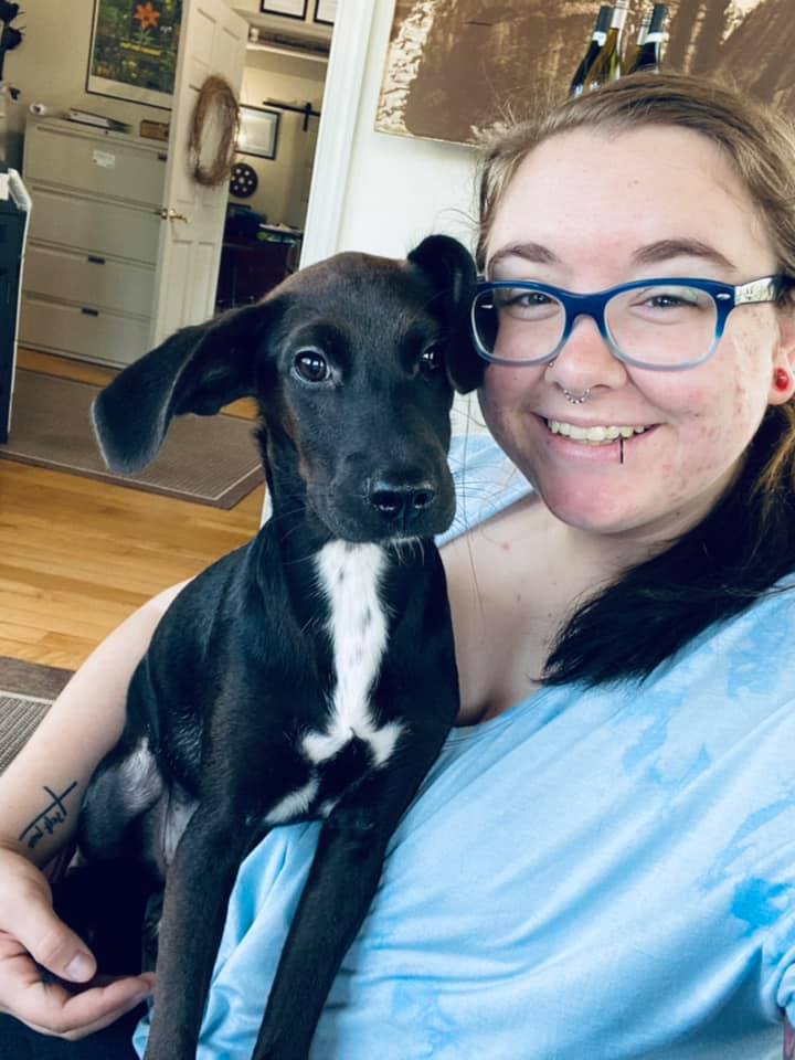 Madison holding her dog, Molly