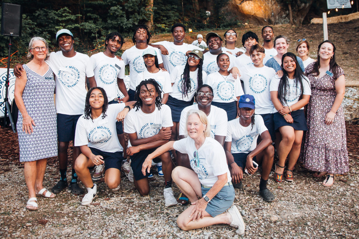 Group photo of the Howard School Leadership Program interns and Lookout Mountain Conservancy staff outside before the annual Shrimp Boil fundraiser